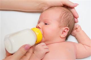 Feeding baby milk bottle