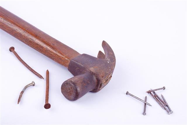 hammer and rust nail
