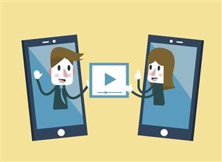 Man and woman sending and share video on smartphone.