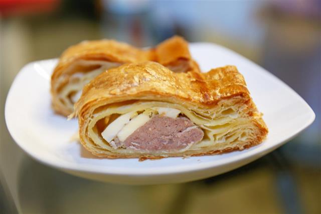 Two ham and egg puff pastry