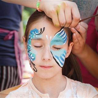 Female child face painting