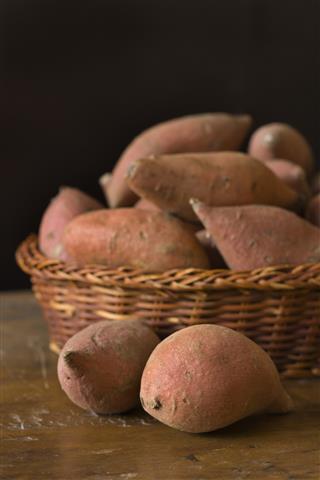 Raw Fresh Yams, Sweet Potato Vegetables in Basket Still Life