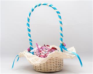 The gift by wicker basket with white background