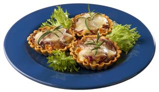 Delicious tartlets with salad under mayonnaise