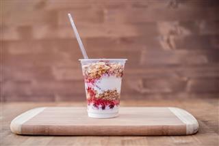 Breakfast granola with yogurt and strawberries
