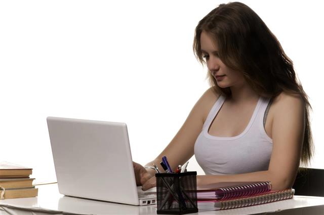 Teenage girl with laptop