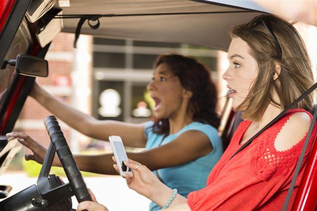 Teenage Girls Texting while Driving