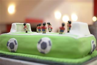 Future soccer player. Baby boy birthday cake stadium like