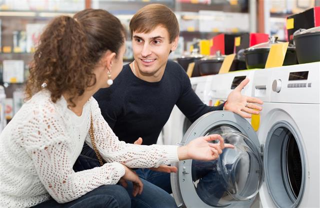 couple Buying Washer and  Dryer