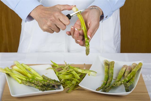 Trim and peel asparagus