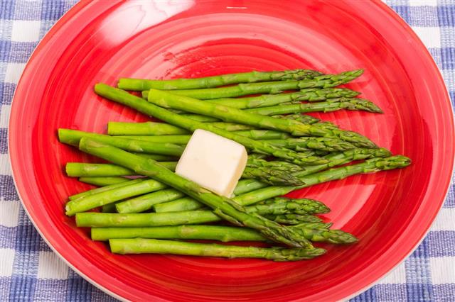 Buttered Asparagus on Red Plate