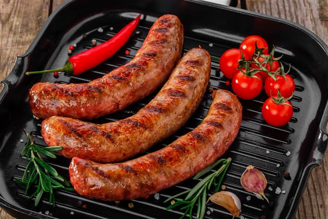 grilled sausages in a pan