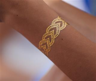 Temporary flash tattoo on a woman's wrist
