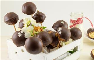 Chocolate cake pops in a wooden box
