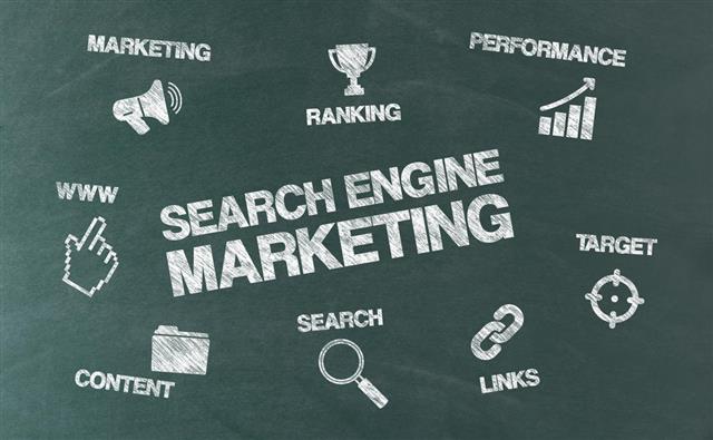 Search Engine Marketing Concept with Icons on Blackboard