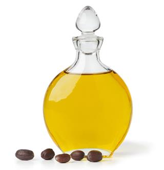 Bottle of Jojoba oil and seeds