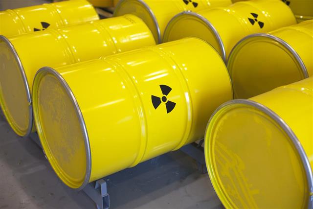 Rows of yellow barrels of radioactive waste