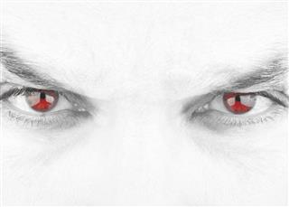 Black and White Evil Stare with Isolated Red Eyes