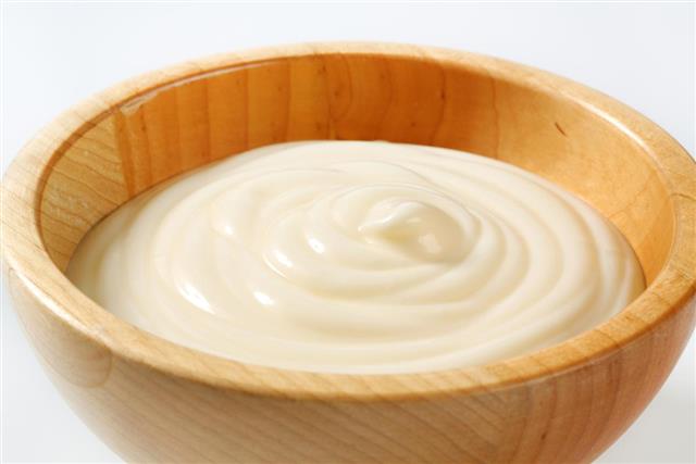 Creamy Sauce in Wooden Bowl