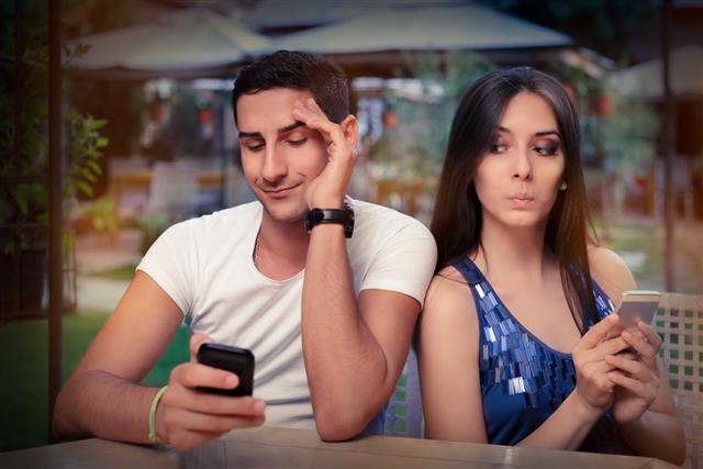 Secretive Couple with Smart Phones
