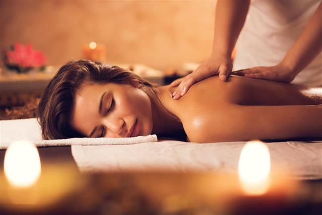 Beautiful woman having a massage at the spa
