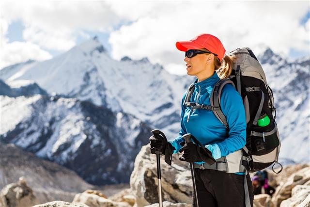 Woman hiking in Himalaya Mountains