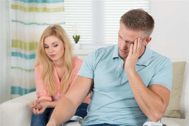 Unhappy Couple Having Argument At Home