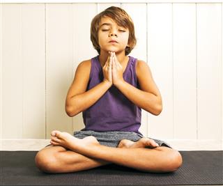 Child in the yoga lotus position