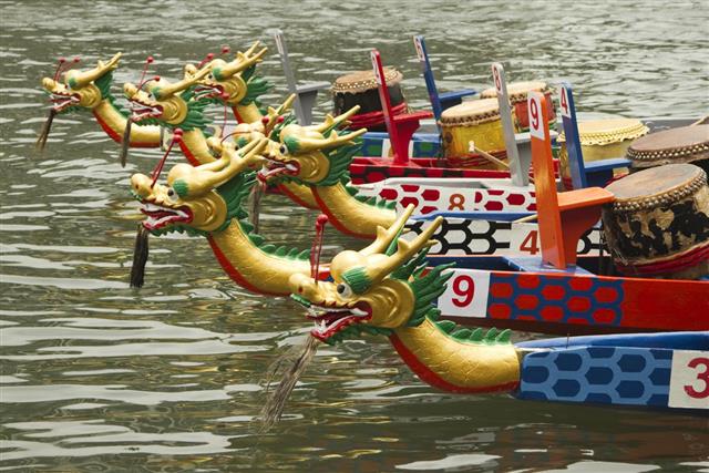 Six Dragon Boats with Different Numbers