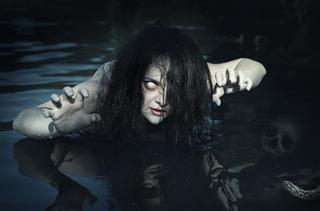 Terrible dead ghost woman in the water