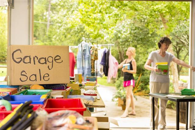 Adult women buying at a yard sale
