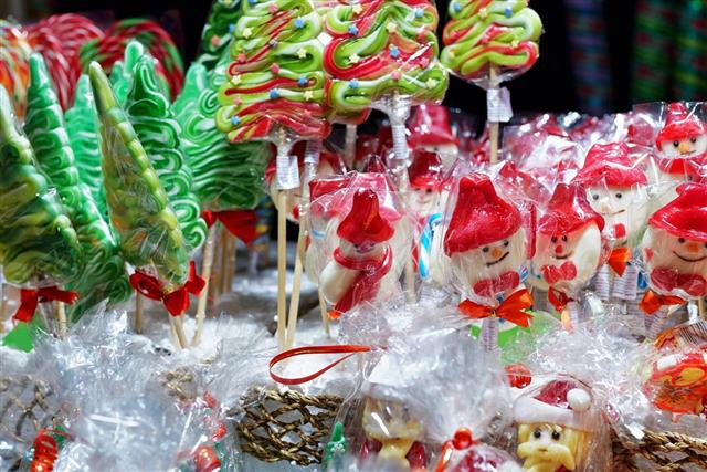 Stall with colorful candies on Christmas Market
