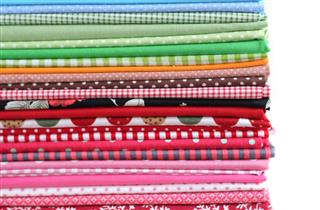 Pile of colorful cotton textile background