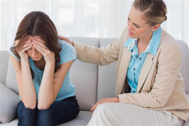 Worried woman with therapist