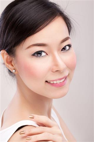 Asian woman with monolid eyes