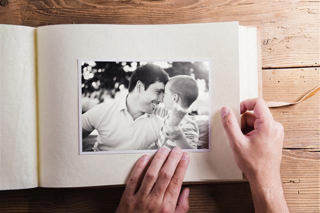 Fathers day composition photo album black and white pictures
