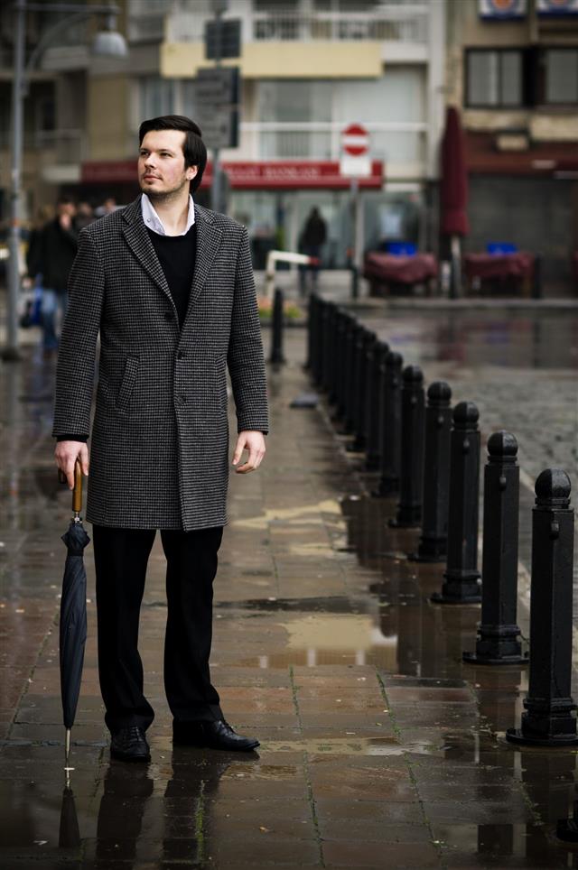 a man in an overcoat