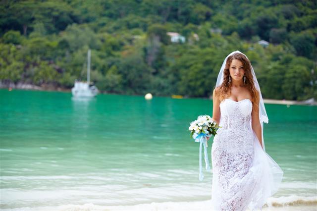 a girl wearing a busty wedding gown