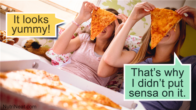 Girls Holding Cheesy Slices Of Pizza In Front Of Faces