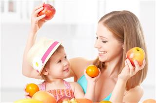 Mother and Daughter with Healthy Food