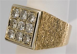 Man's gold ring with diamonds