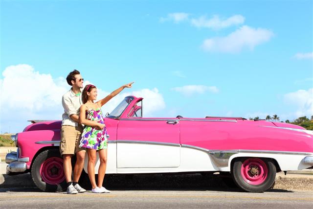 Vintage car - couple pointing