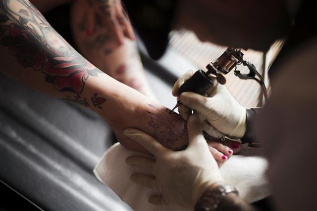 Putting Tattoo Ink on Skin