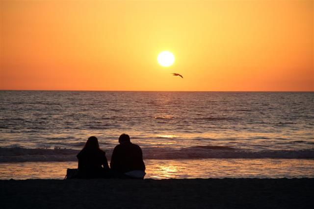 Couple watching sunset