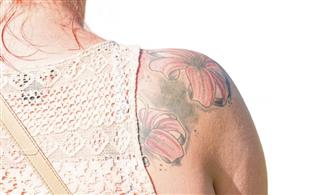 Woman with flowers tattoo