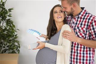 Couple making decision about baby's room color