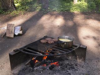 Cook pot over campfire