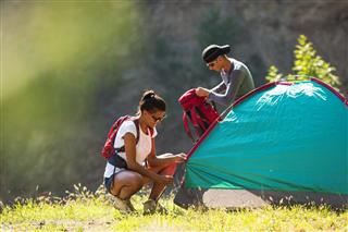 Couple Setting up tent