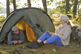 Senior couple camping