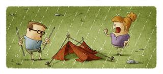 couple camping in rain